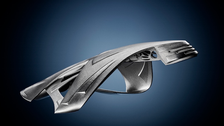 A model of the starship made via additive manufacturing on dark background.