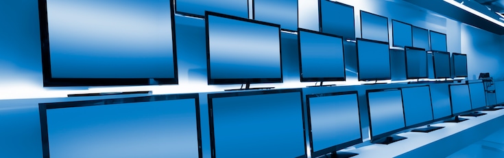 Flat-panel TV screens on a store shelf