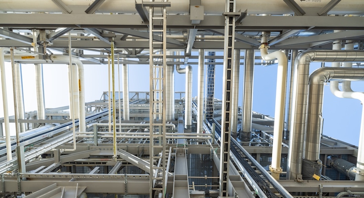 View of chemical plant overhead piping