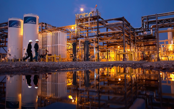 View of oil refinery, with water treatment, in operation at night