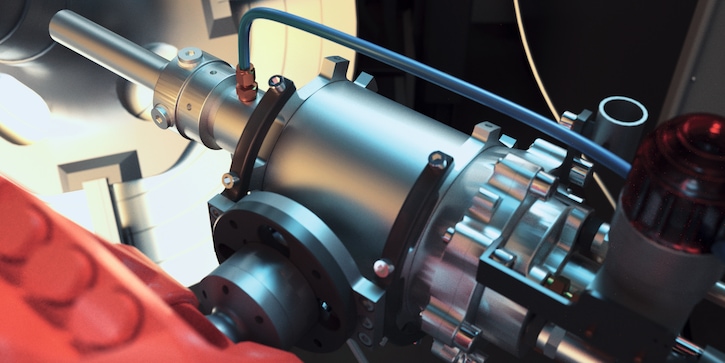 A close-up of the spray nozzle from a cold spraying unit in operation.