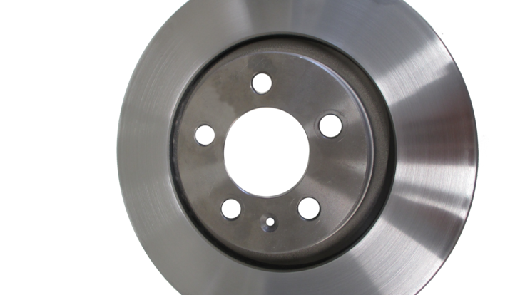 A close up of a car brake disc where cold spraying is used to enhance surface properties.